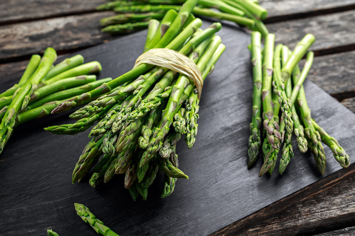 Green and white asparagus contain different enzymes and, like fresh salads and vegetables, are carbohydrates